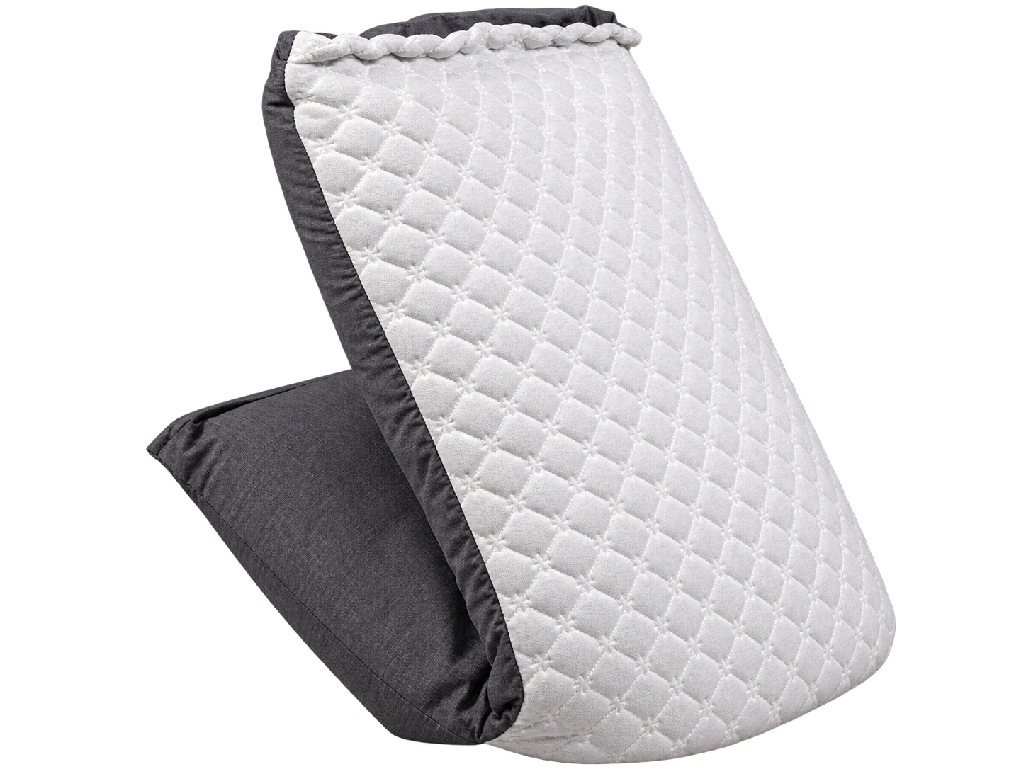 Woman using the folded Starvion pillow as a backrest while reading in an armchair